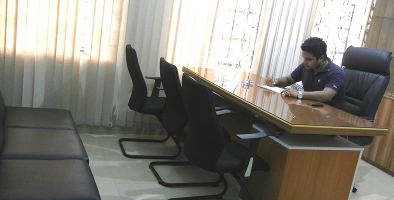 mahfuz-anam-working-on-office